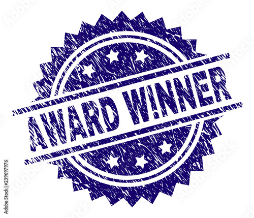 AWARD WINNER stamp seal watermark with distress style. Blue vector rubber print of AWARD WINNER text with scratched texture.