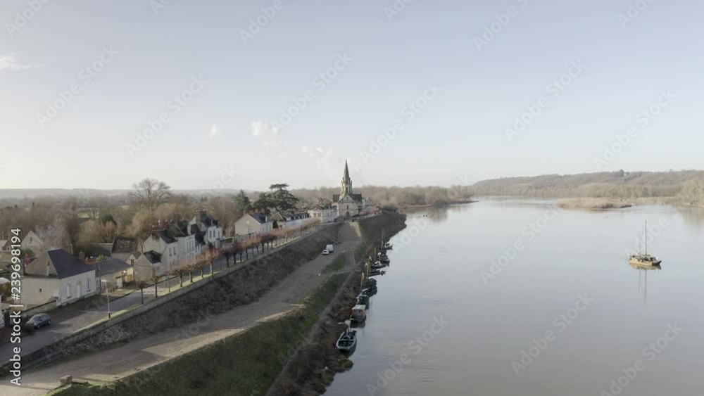 Aerial of the village of Brehemont and the river Loire, France. Aerial of the village of Brehemont and the river Loire, France.