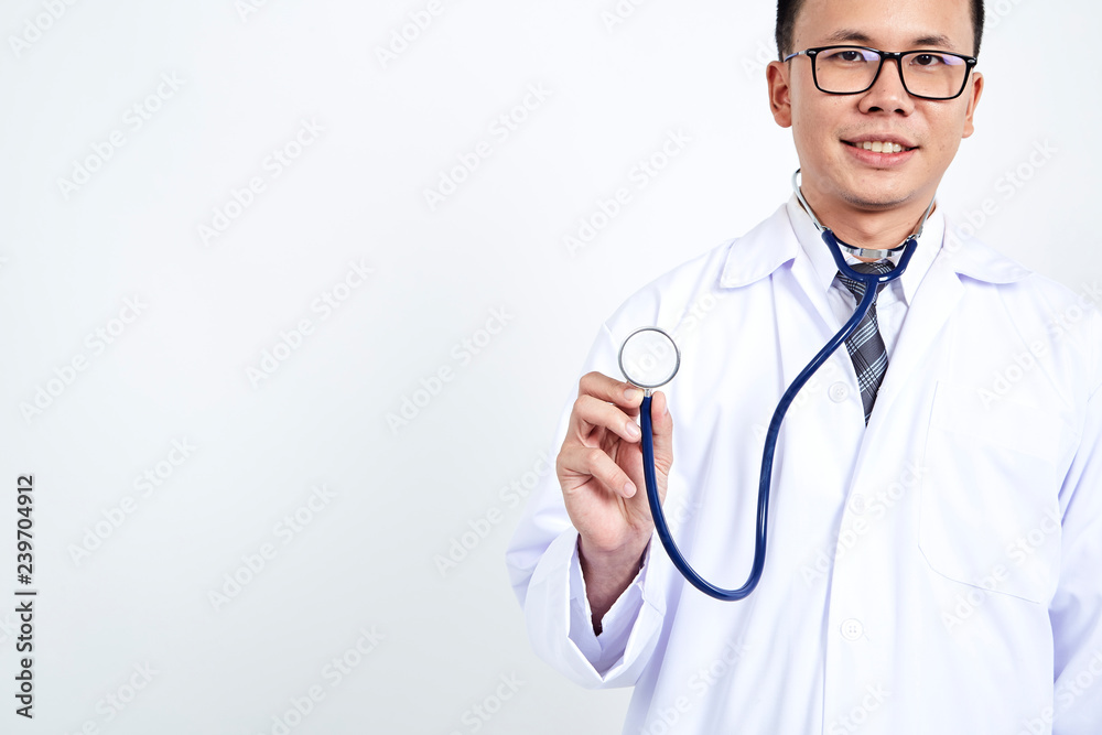 Fototapeta premium Doctor holding stethoscope on white background