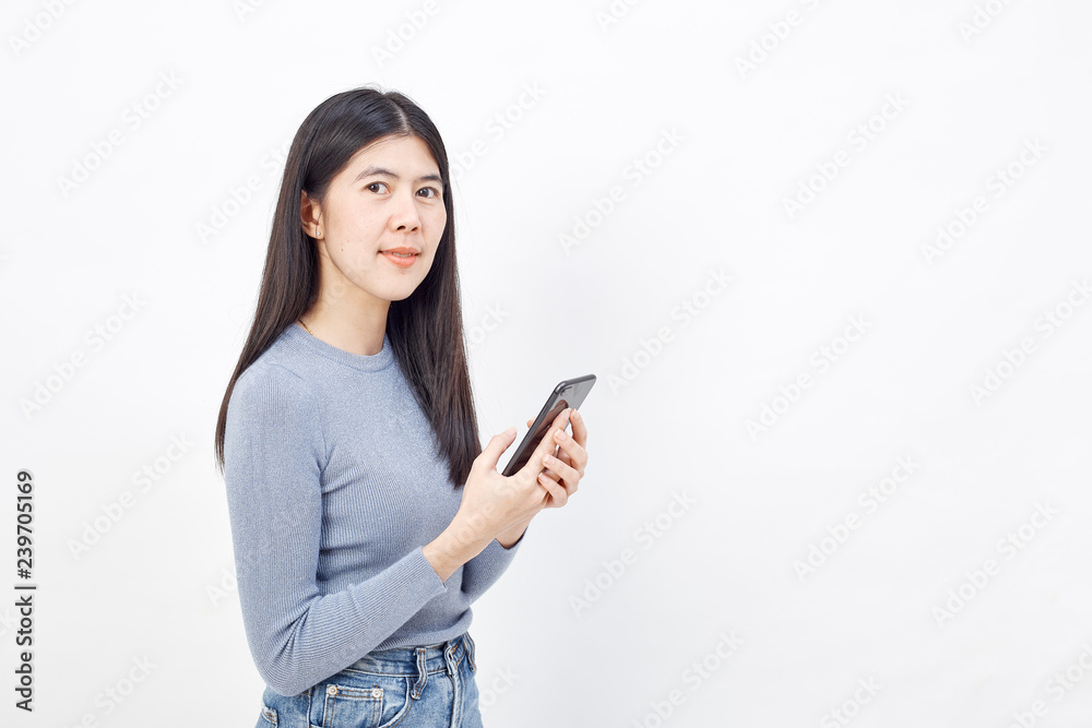 Asian woman use of the cellphone Asian woman use of the cellphone