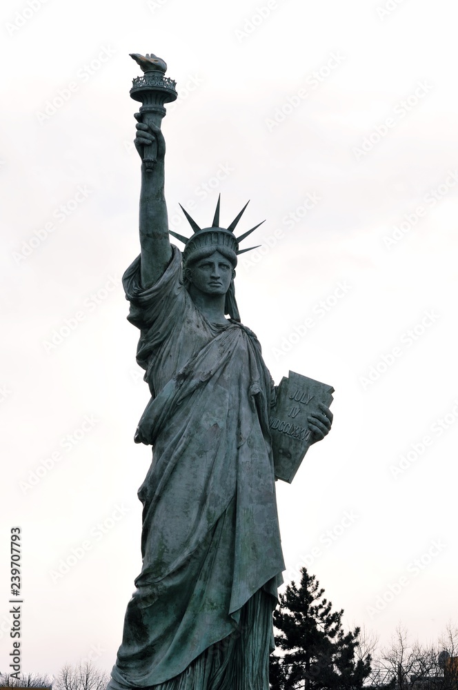 Obraz premium A copy of the Statue of Liberty greets visitors to the birthplace of Auguste Bartholdi at Colmar in France.