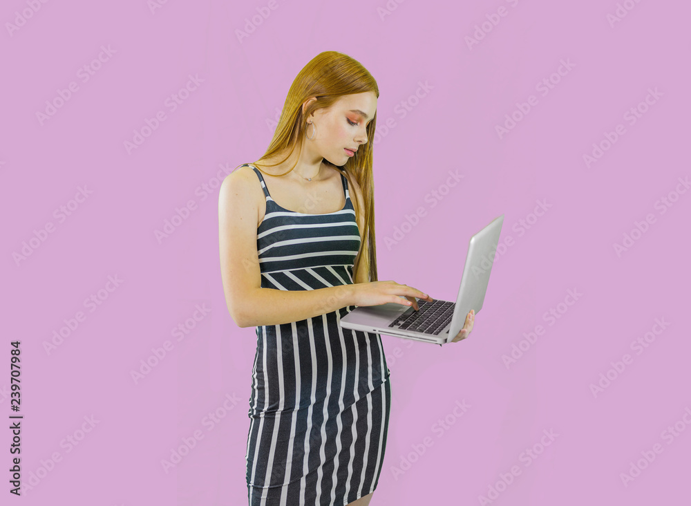 Girl makes purchase in the online store isolated background Girl makes purchase in the online store isolated background