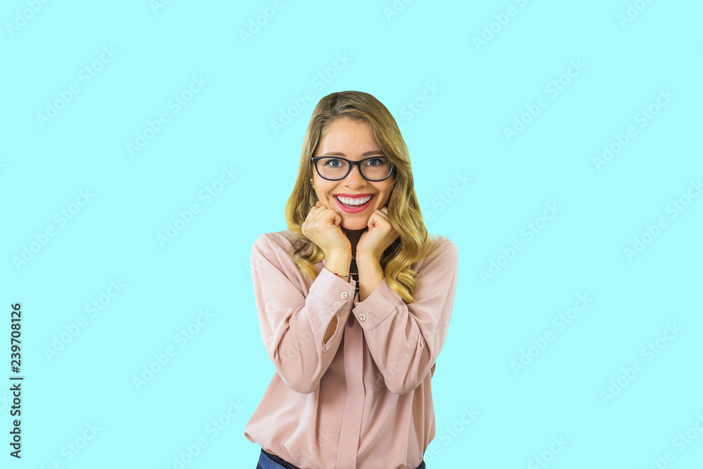 Girl smiling with perfect smile and white teeth on an isolated background and looking at camera Girl smiling with perfect smile and white teeth on an isolated background and looking at camera