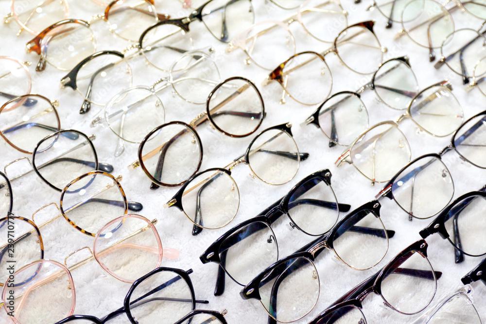Glasses, Eyeglasses Optical Store, Fashion eyewear at night market, Colorful glasses, Glasses on shelf, Glasses in optical store shopping mall (Selective Focus) - obrazy, fototapety, plakaty 