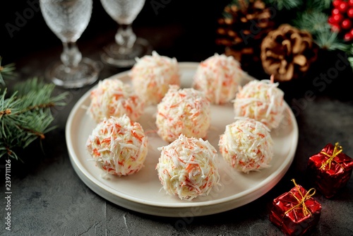 Cheese balls in crab shavings is a traditional Russian snack for Christmas and New Year's party.