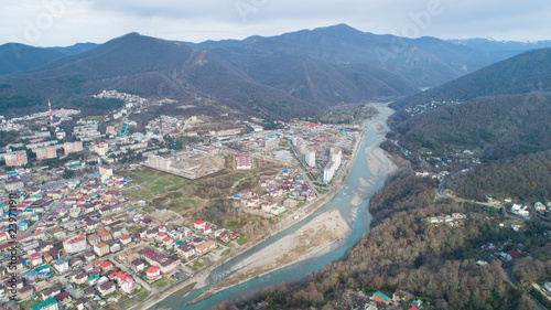 Lasarevskoye, Sochi. Winter. Aerial view of a coastal town in mountains photo