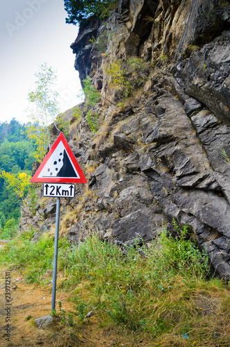 road sign and mountain view on Transfagarasan highway, Romania