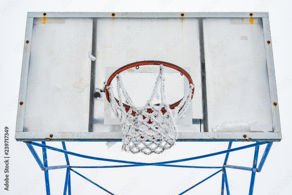 Fototapeta premium Basketball court covered with snow