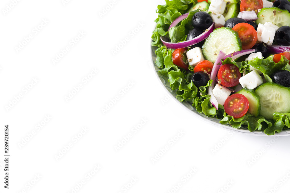 Fresh Greek salad in Plate with black olive,tomato,feta cheese, cucumber isolated on white background. Copyspace Fresh Greek salad in Plate with black olive,tomato,feta cheese, cucumber isolated on white background. Copyspace