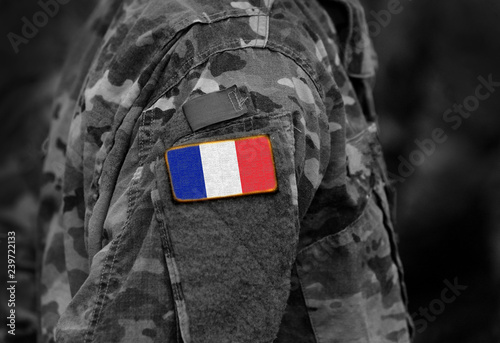 Flag of France on soldiers arm (collage). photo