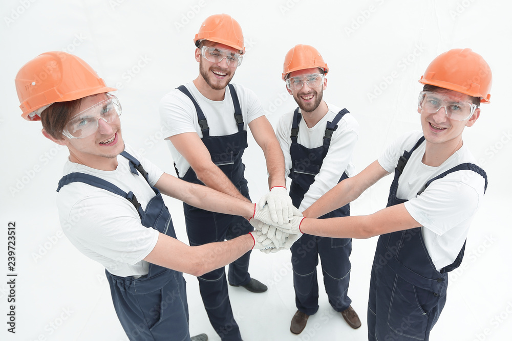 team of builders showing their solidarity team of builders showing their solidarity