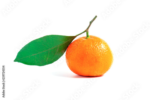 Tangerine or clementine with green leaf isolated on white background