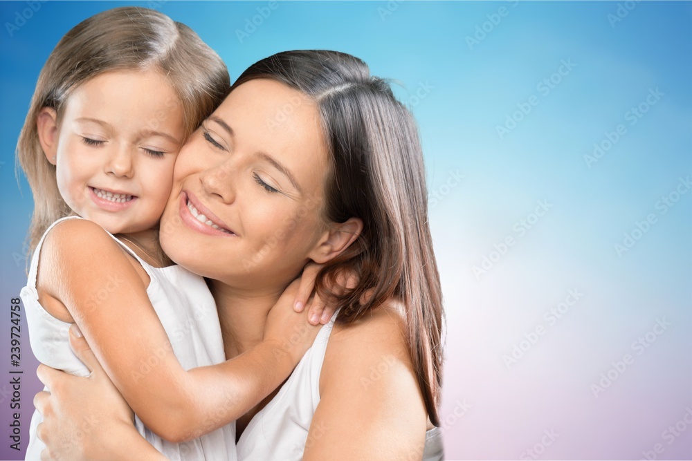 Happy Mother and daughter hugging Happy Mother and daughter hugging