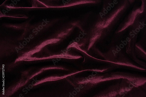 Fabric texture, imitation silk, fabric with folds. Textile texture. Abstract Background by purple fabric.