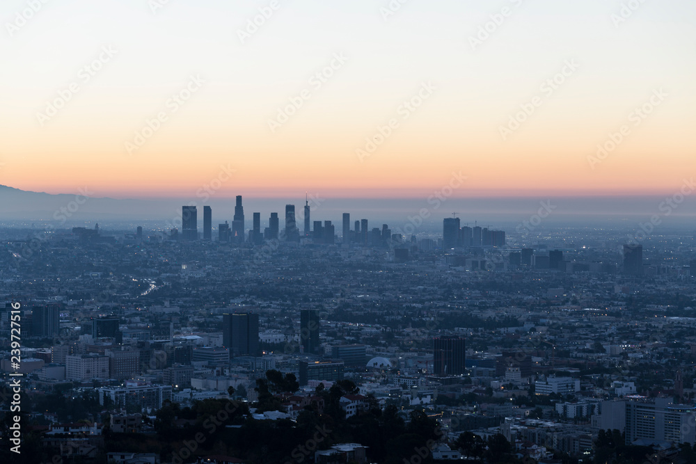 Predawn cityscape view of Hollywood and downtown Los Angeles, California.  Shot from Runyon Canyon Park hiking trail in the Santa Monica Mountains.  