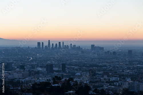 Predawn cityscape view of Hollywood and downtown Los Angeles, California. Shot from Runyon Canyon Park hiking trail in the Santa Monica Mountains. 