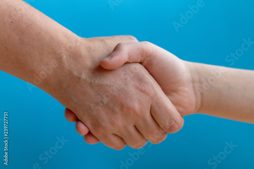 hand shake between man and son