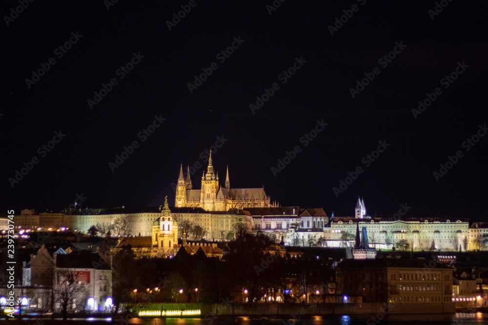 Prague, Czech Republic, Europe,Night panorama overlooking the historic buildings of Prague Castle, Charles Bridge and the Vltava River