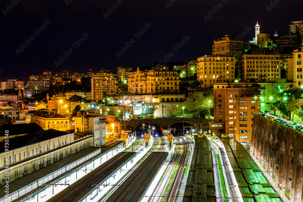 Night views over the italian city Genova and railwayroads, Liguria, Italy