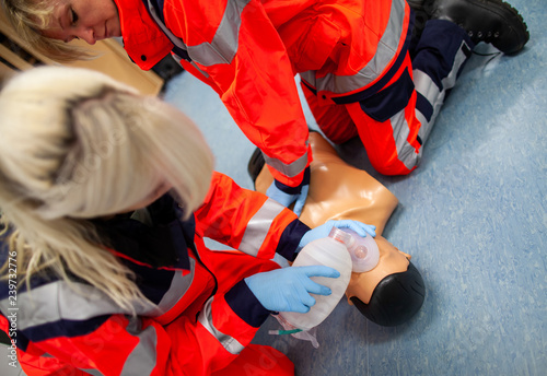 German paramedic trains emergency basics on a puppet