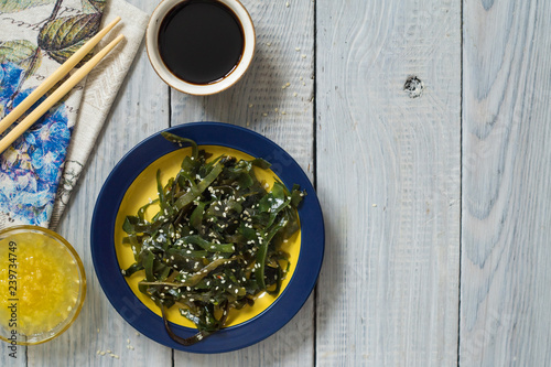 Kelp superfood with sesame, lemon and sauce photo