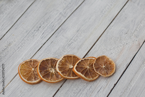 Fototapeta Naklejka Na Ścianę i Meble -  five five dried orange slices