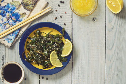 Kelp superfood with sesame, lemon and sauce photo