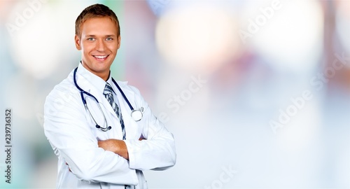 Portrait of doctor with stethoscope on blurred background