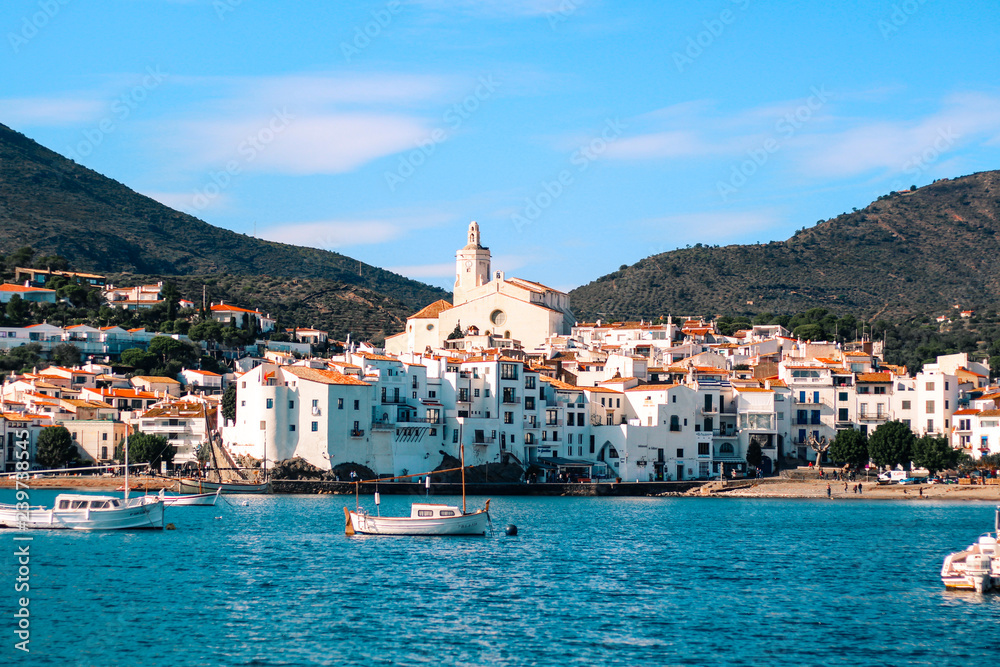 Cadaque's village in Spain, bright water with white houses. - obrazy, fototapety, plakaty 