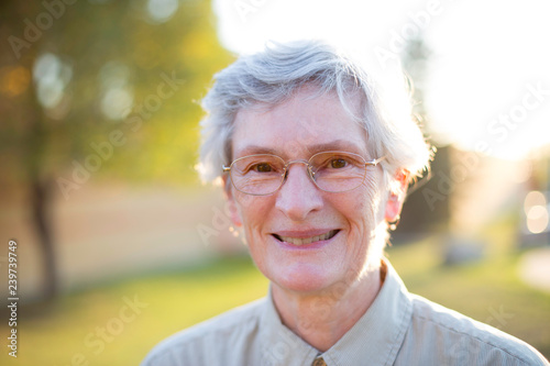 smiling senior woman outdoors