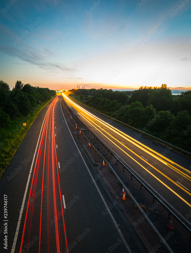 light trails on the road light trails on the road