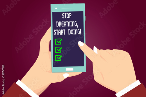 Writing note showing Stop Dreaming Start Doing. Business photo showcasing Put your dreams into action Materialize it Hu analysis Hands Holding Pointing Smartphone Blank Color Screen