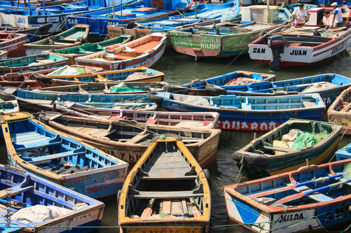 Boats in the harbour by fishermen in Peru © Claudio Quacquarelli