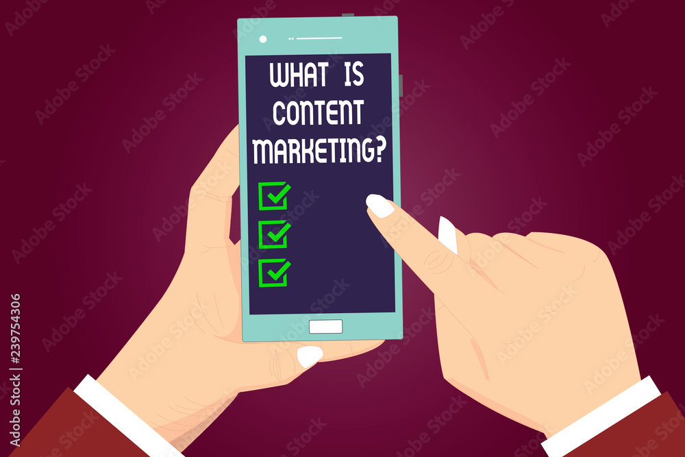 Writing note showing What Is Content Marketing. Business photo showcasing Advertising and business promotion strategies Hu analysis Hands Holding Pointing Smartphone Blank Color Screen Writing note showing What Is Content Marketing. Business photo showcasing Advertising and business promotion strategies Hu analysis Hands Holding Pointing Smartphone Blank Color Screen