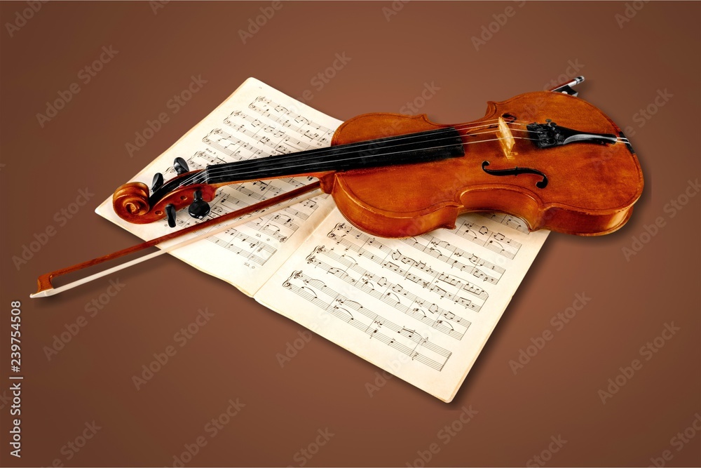 Fototapeta premium Close-up Photo Of Violin And Musical Notes