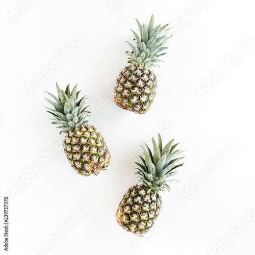 Pineapples isolated on white background. Food concept. Flat lay  top view