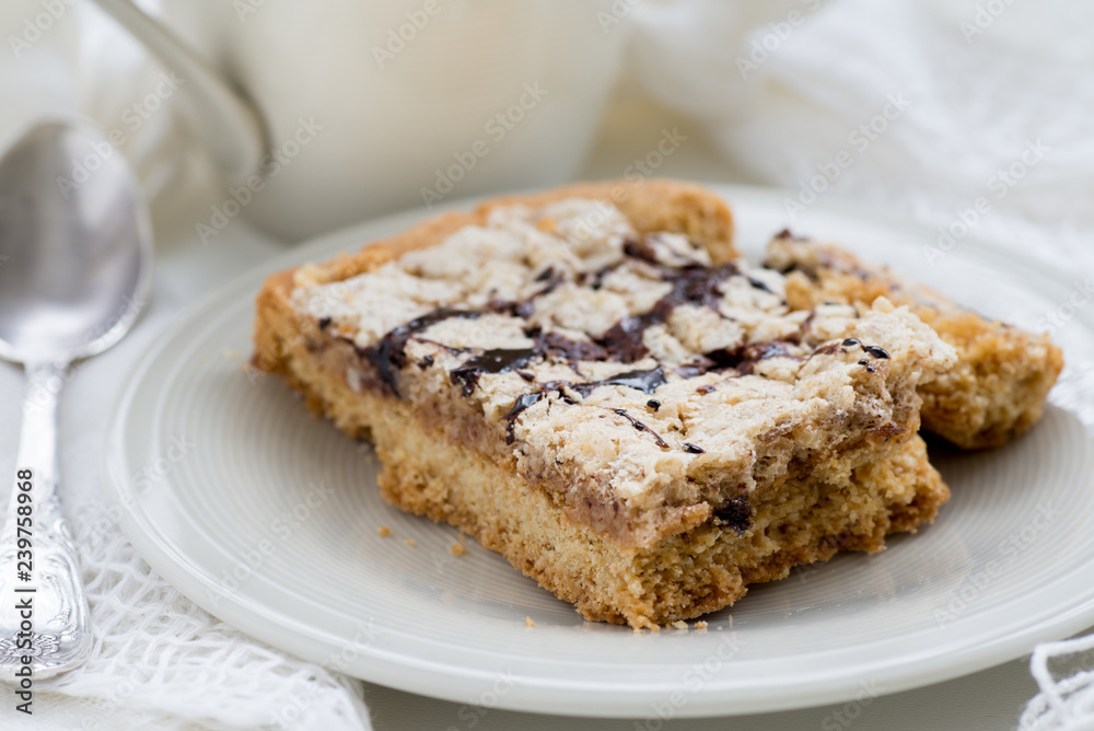 Mazurek, traditional polish tart baked for Easter. In some regions it is also prepared at Christmas and holiday season. Decorated with nut-based icing or almond-based icing Mazurek, traditional polish tart baked for Easter. In some regions it is also prepared at Christmas and holiday season. Decorated with nut-based icing or almond-based icing