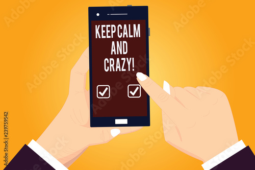 Word writing text Keep Calm And Crazy. Business concept for Relax and go insane happy get excited celebrate Hu analysis Hands Holding Pointing Touching Smartphone Blank Color Screen