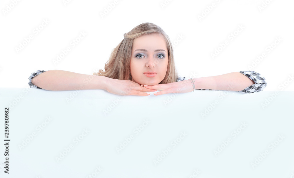 young business woman relies on a large blank poster on white background young business woman relies on a large blank poster on white background