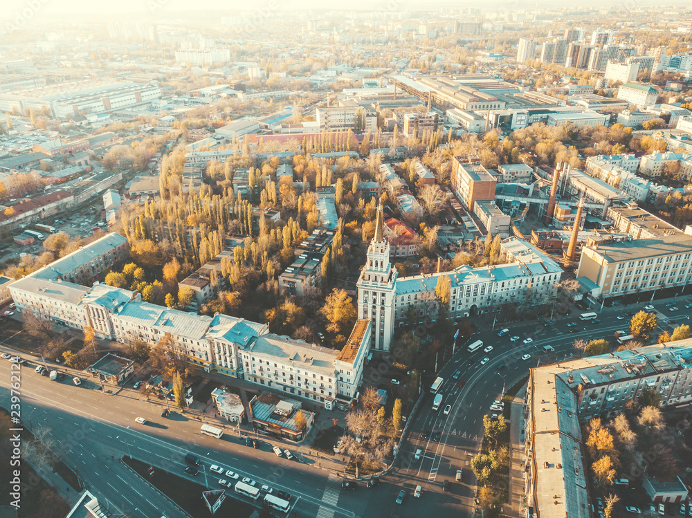 Aerial panoramic view of midtown of Voronezh city at sunset, Russia. Famous buildings and urban architecture with roads and car traffic
