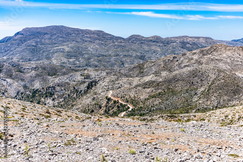 Psilorities mountain range panoramic skyline view at 2000m altutude. Mountaineering adventure trekking paradise, hiking paths, biking trails, challenging peaks. Heraklion, Crete Greece. photo