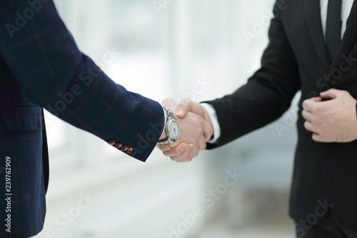 close up. confident handshake of business people © yurolaitsalbert