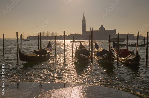 Gondolas on Grand Canal and San Giorgio Maggiore Church in Venice Italy. © dannywilde