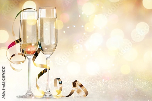 Two glasses of champagne isolated on white background