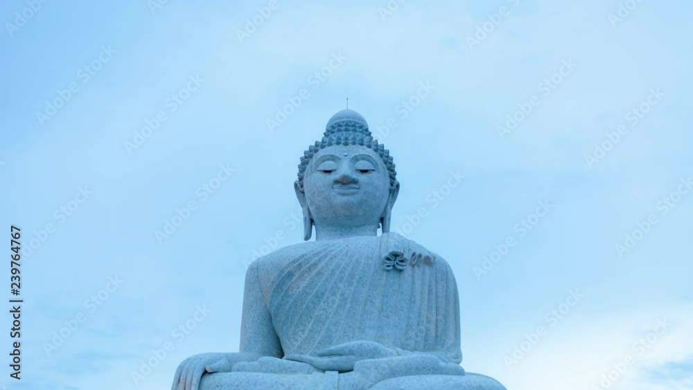 Time lapse of big buddha with clouds moving fast in the sky in bad weather day Time lapse of big buddha with clouds moving fast in the sky in bad weather day
