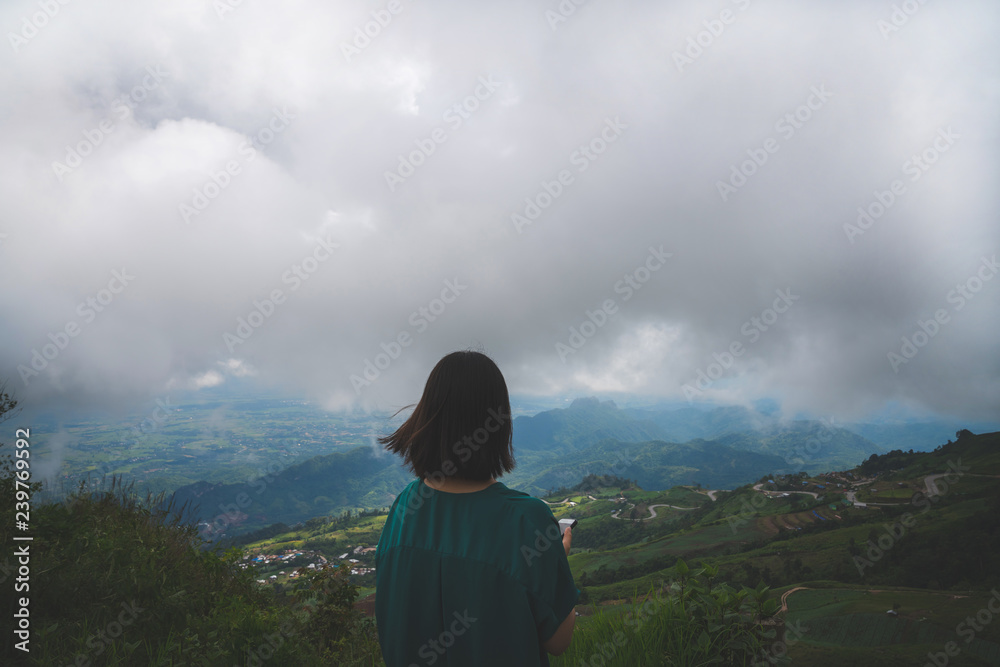 Happy young cute asian Japanese girl hipster backpack  women travelling looking at beautiful sky mountains scenery views 