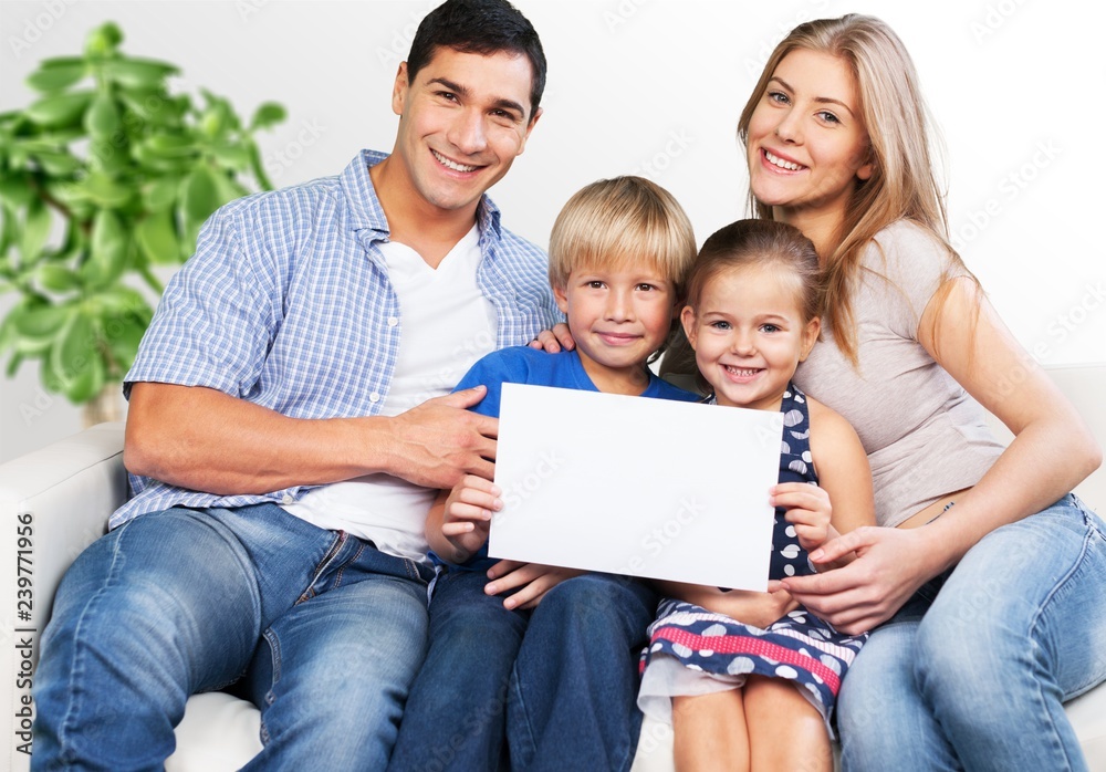 Beautiful smiling family on background Beautiful smiling family on background