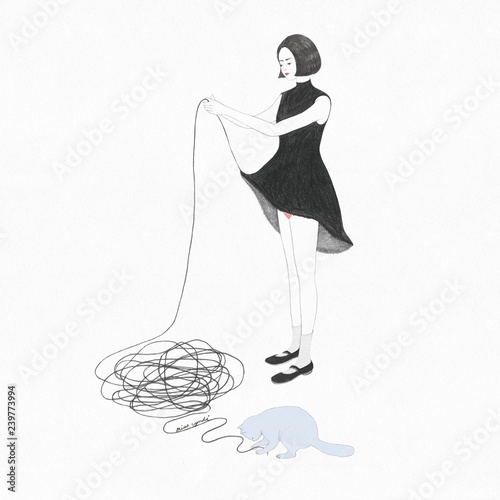 Woman removing yarn from her dress photo