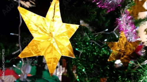 4k Video Golden Paper Stars on Christmas Tree