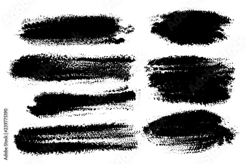 Vector set of hand drawn brush strokes  stains for backdrops. Monochrome design elements set. One color monochrome artistic hand drawn backgrounds.
